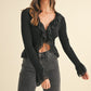 FEARLESS BLACK RUFFLED RIBBED LONG-SLEEVE TIE-FRONT TOP