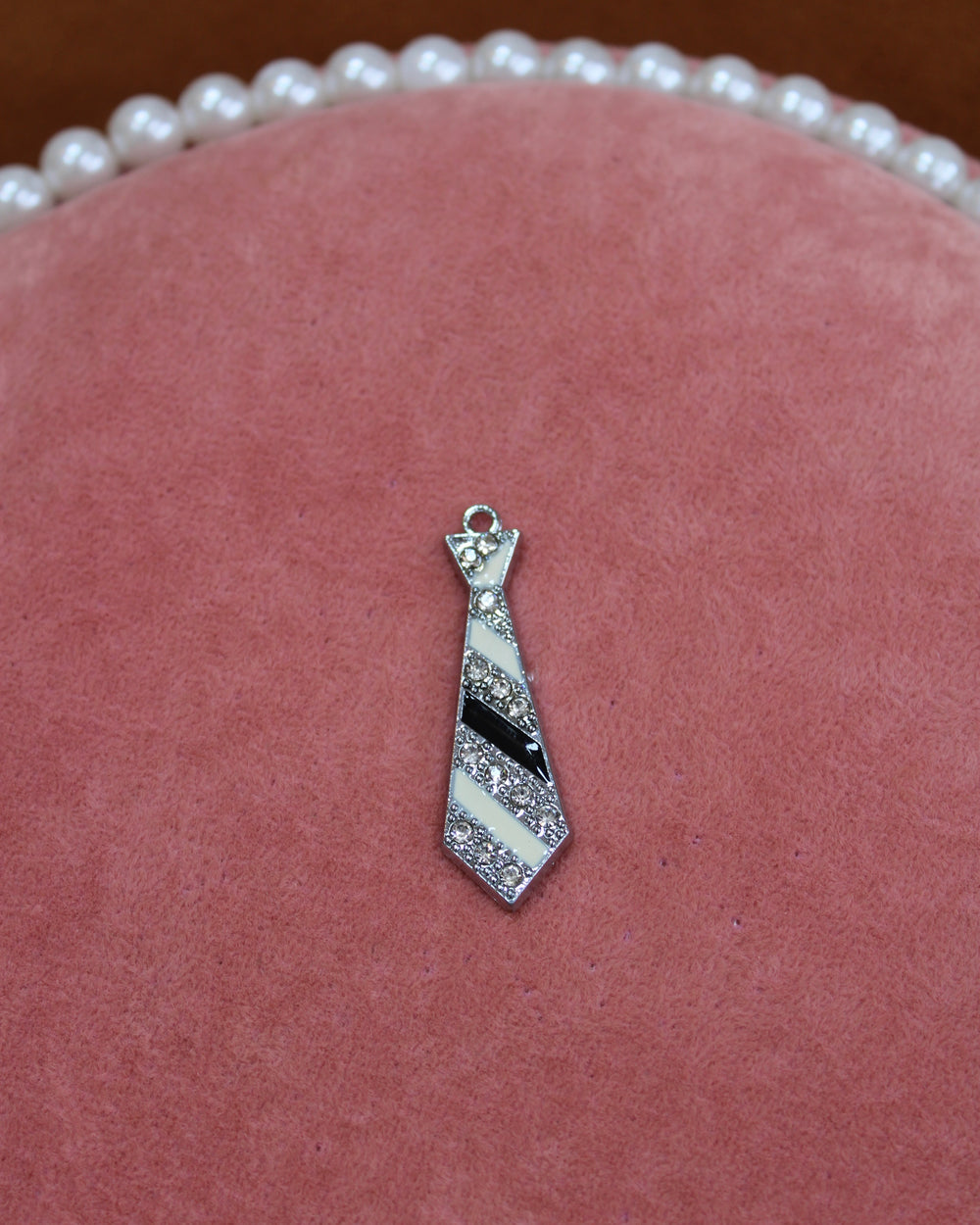 Gold, Silver, and Black Tie Charm