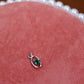 Dainty Green Gem Wishbone Charm