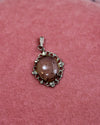 Clear Oval Stone Spotted Charm