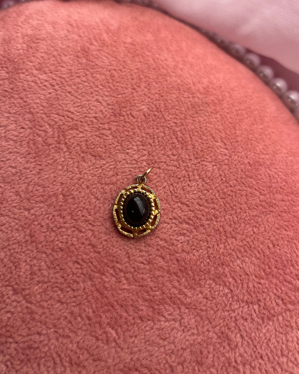 Small Black Oval Stone Gold Charm